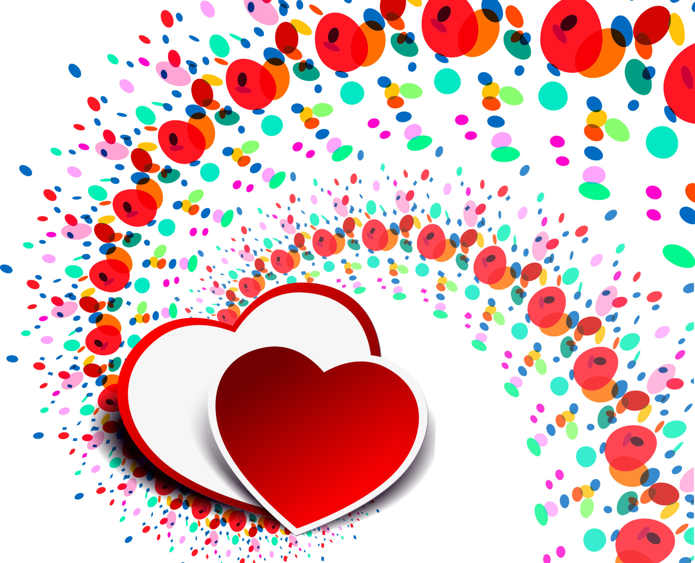Zwei rote Herzen liegen vor einem bunten, spiralförmigen Wirbel aus farbigen Punkten und Kreisen.